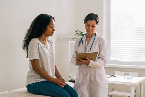 woman visiting doctor
